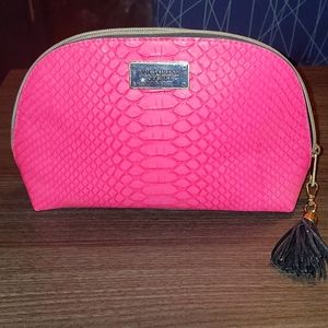 Large croc style vs pink makeup bag